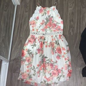 mod length dress with rose design and lace